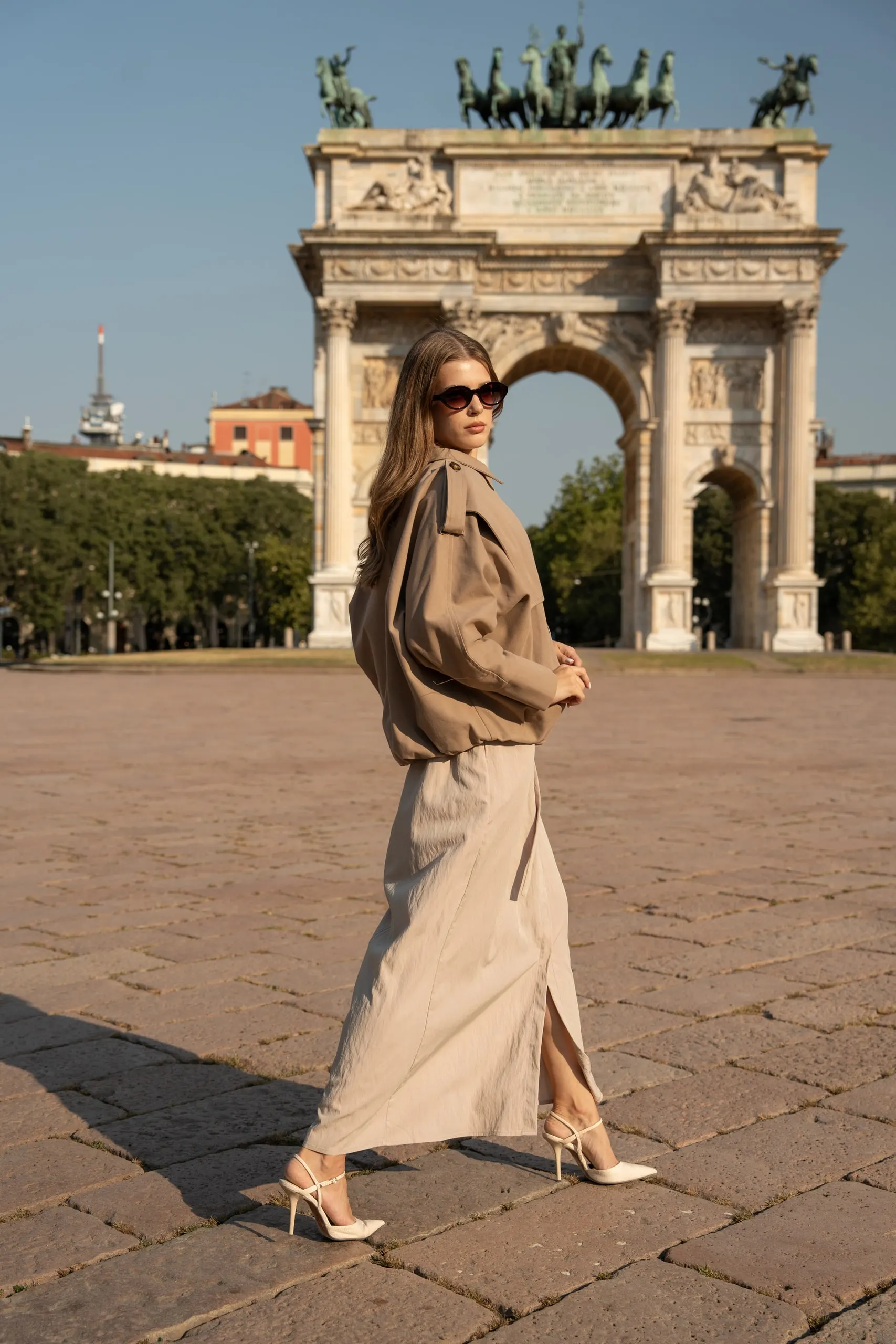 Atelier èmi — taupe jacket and cream skirt at the Arco della Pace