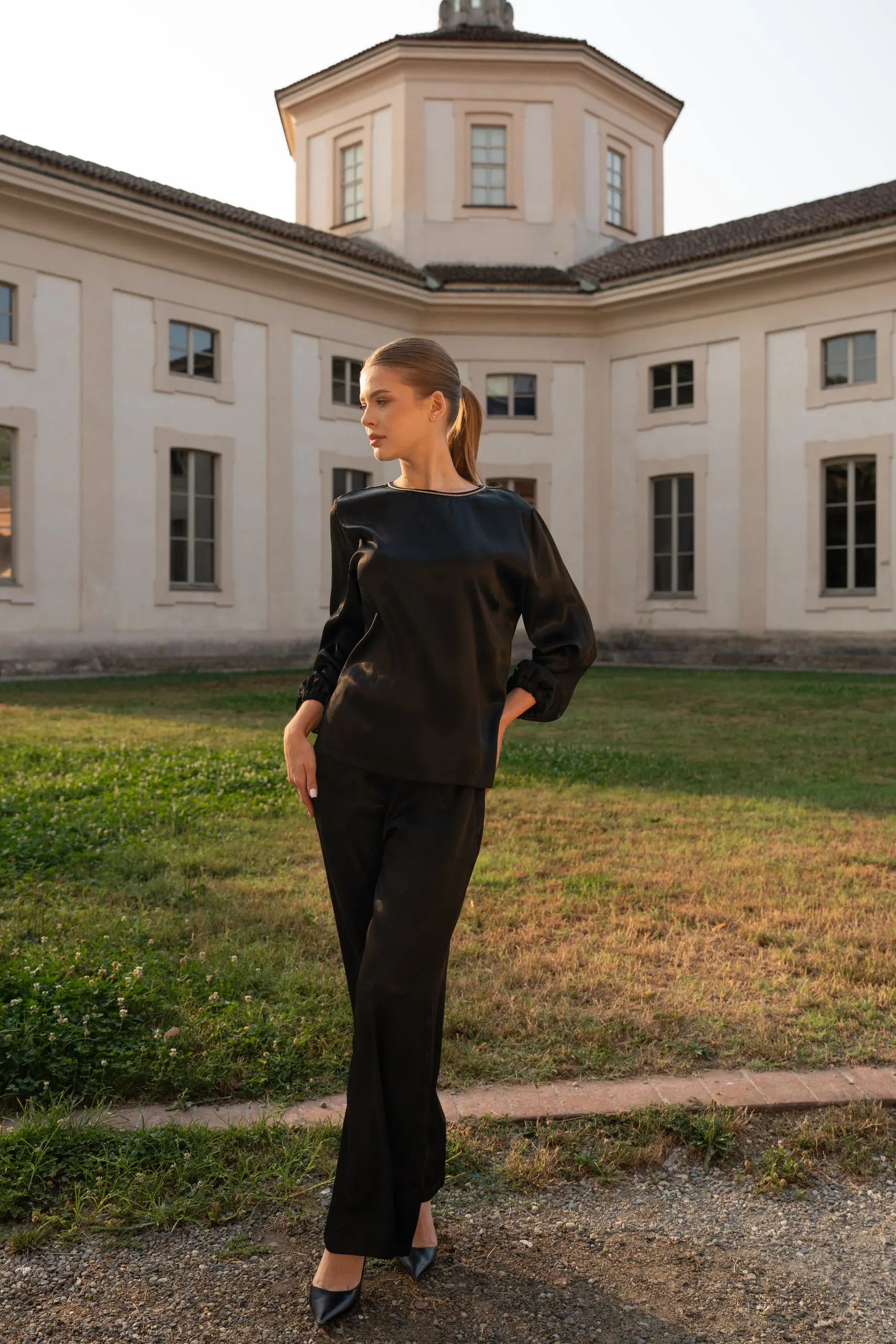 Atelier èmi — black satin set by the villa