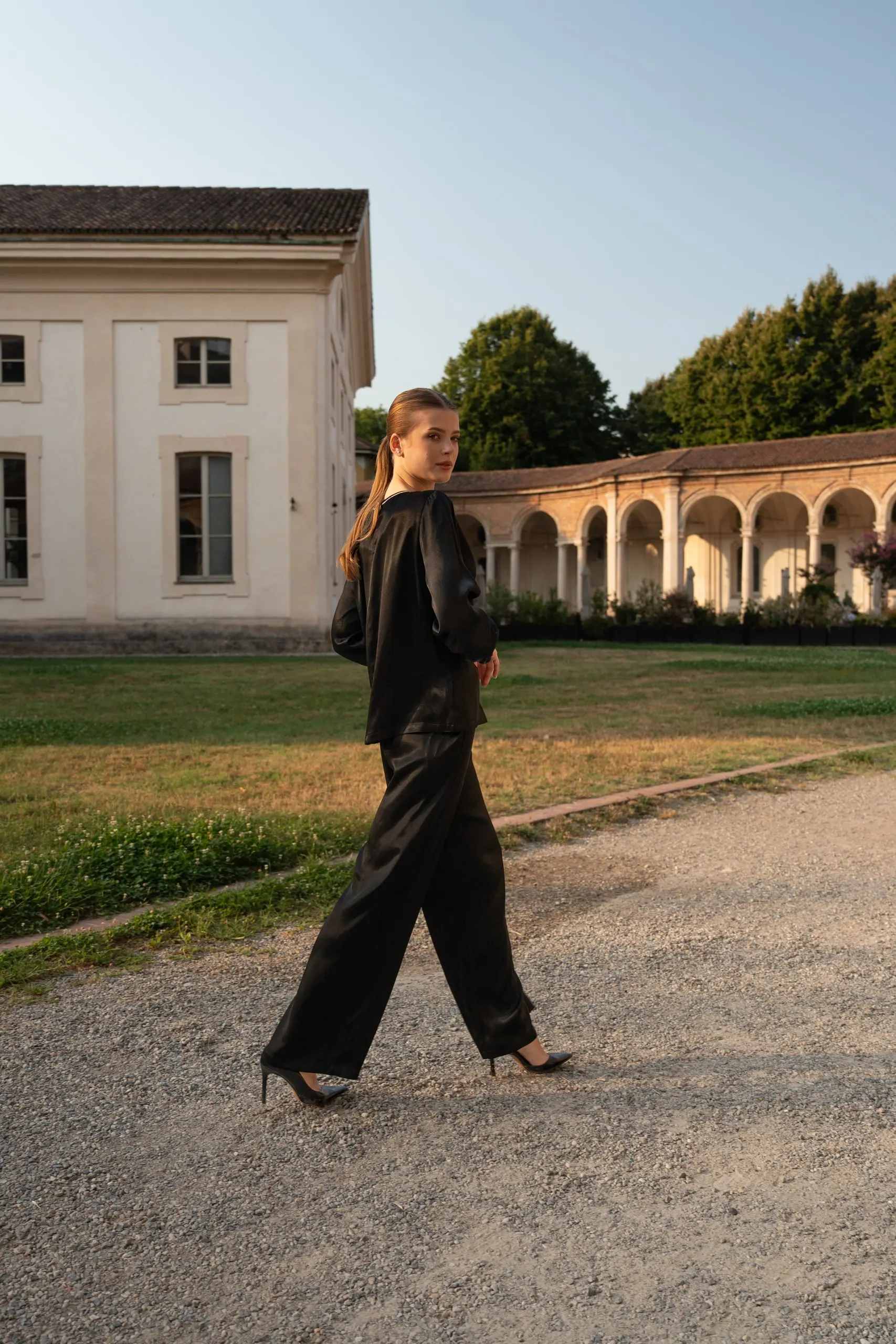 Atelier èmi — black satin along the arcade