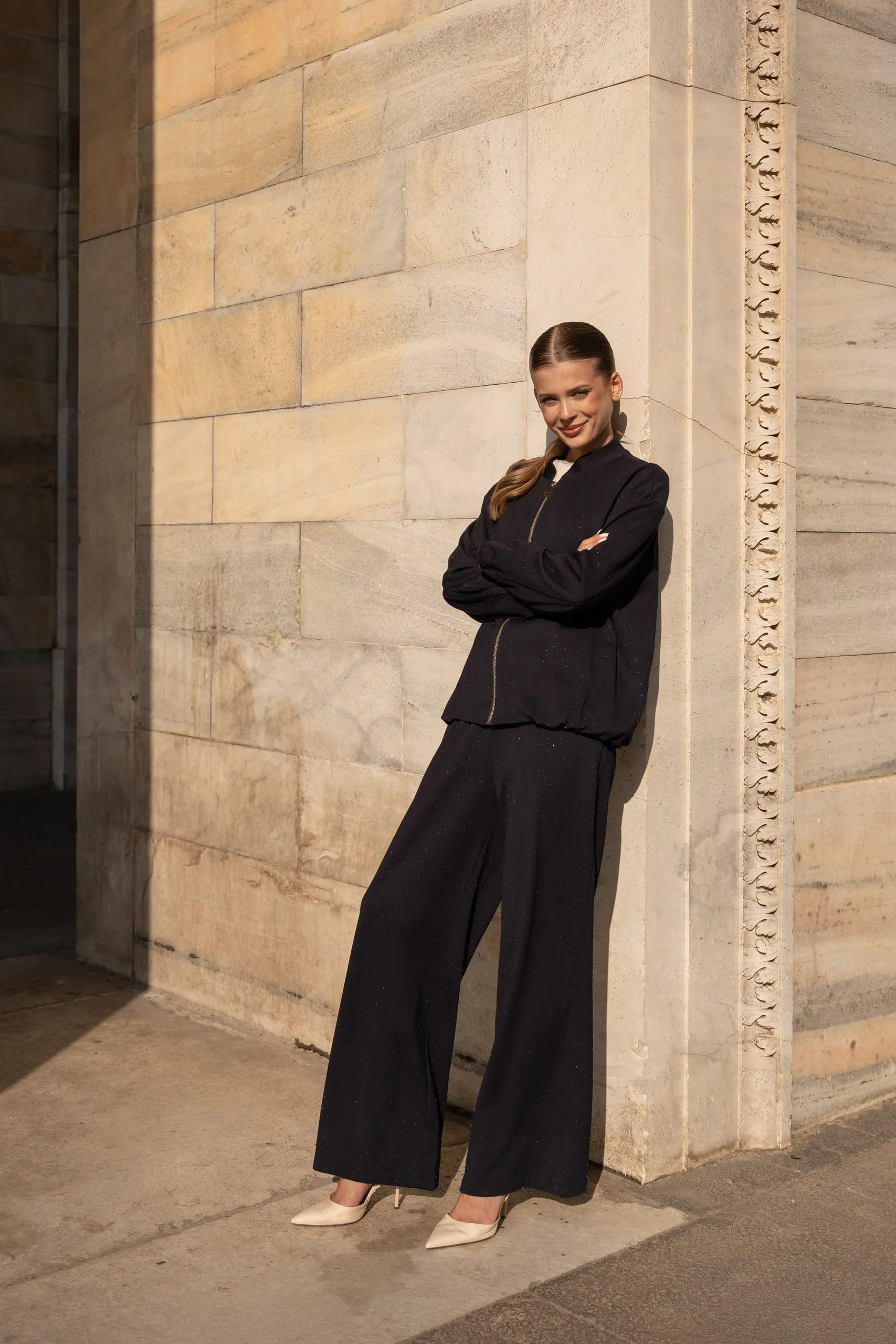 Atelier èmi — black set against stone