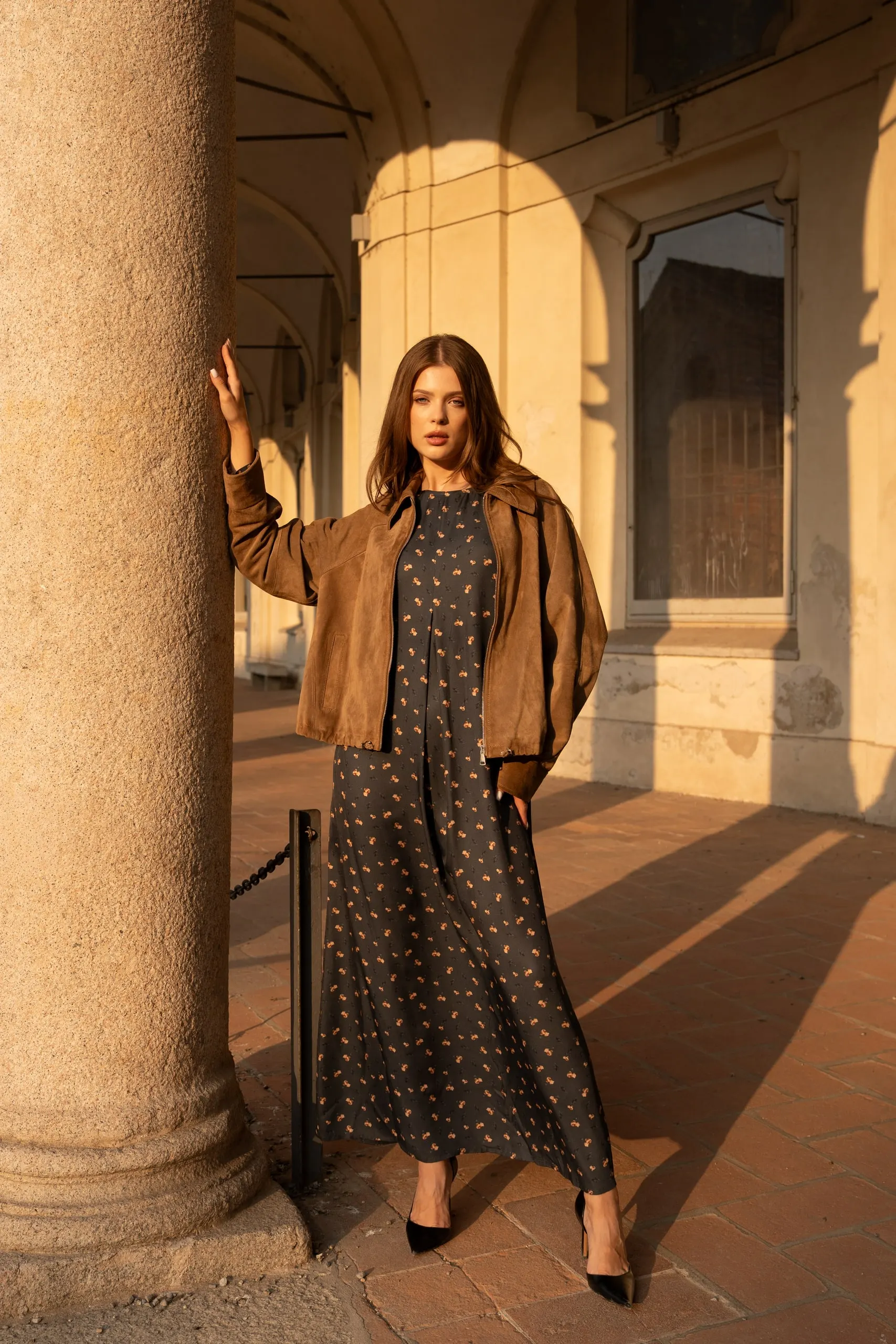 Atelier èmi — suede jacket in the portico