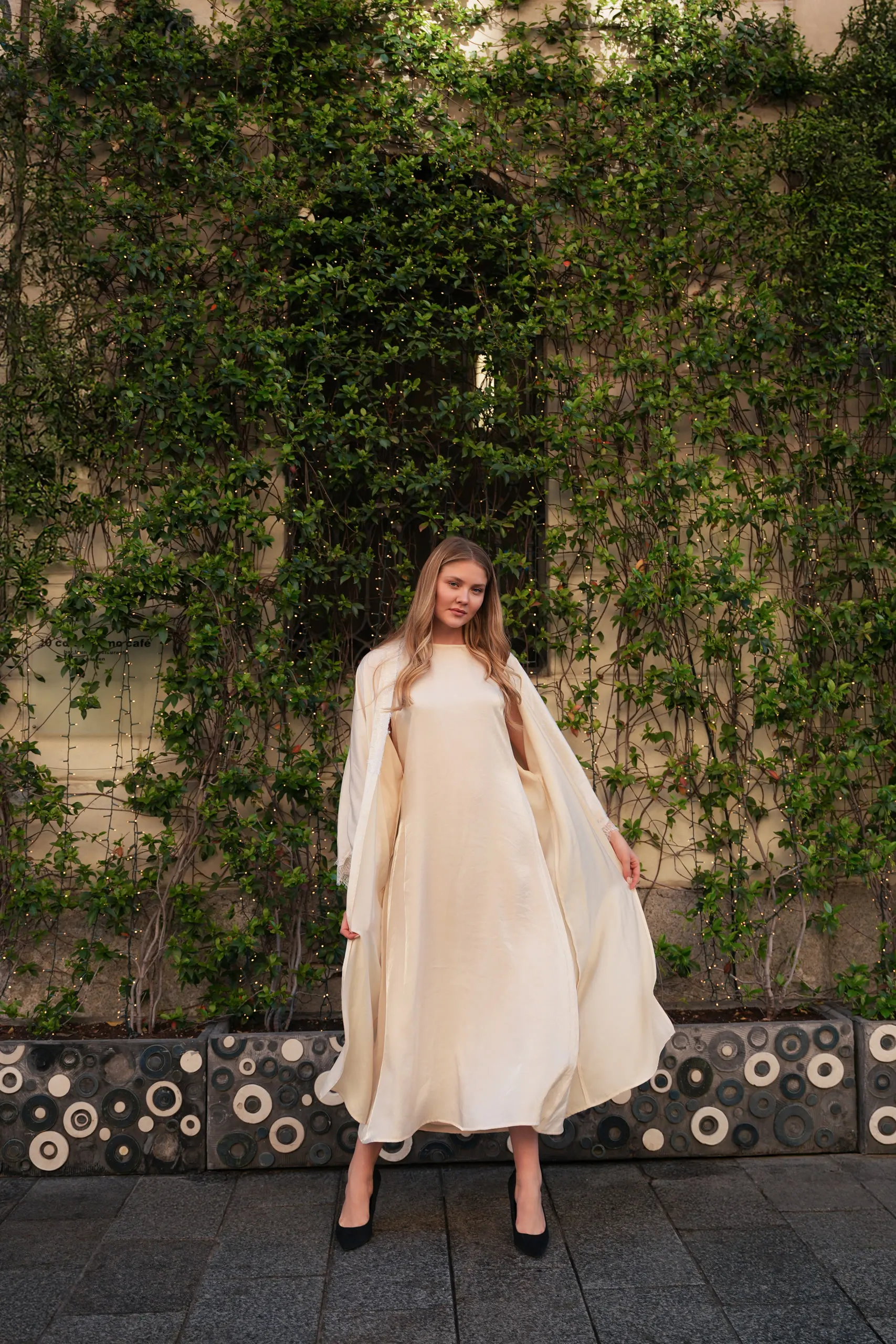 Atelier èmi — cream dress by the roses