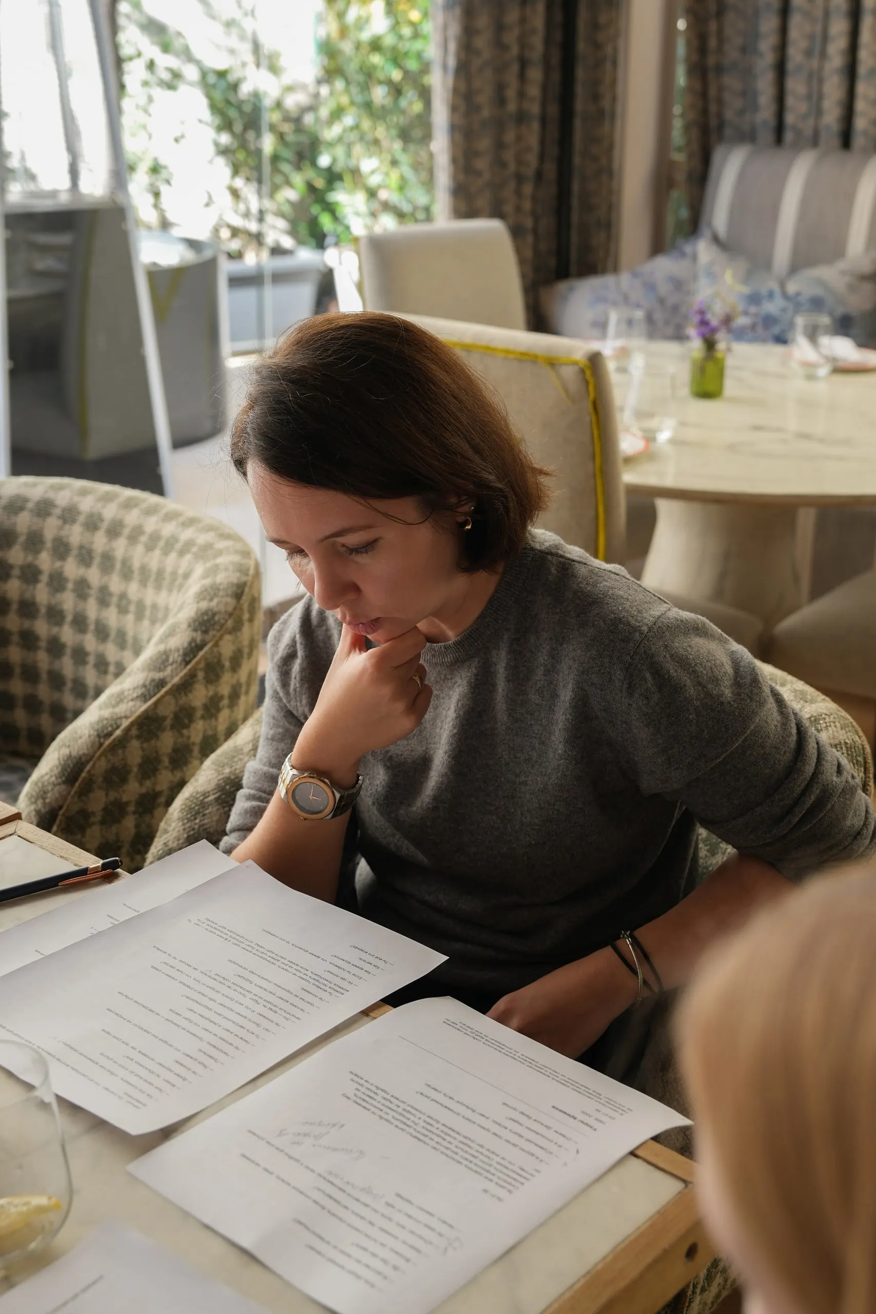 Book club — Elena Bulanaya — participant reading her printout