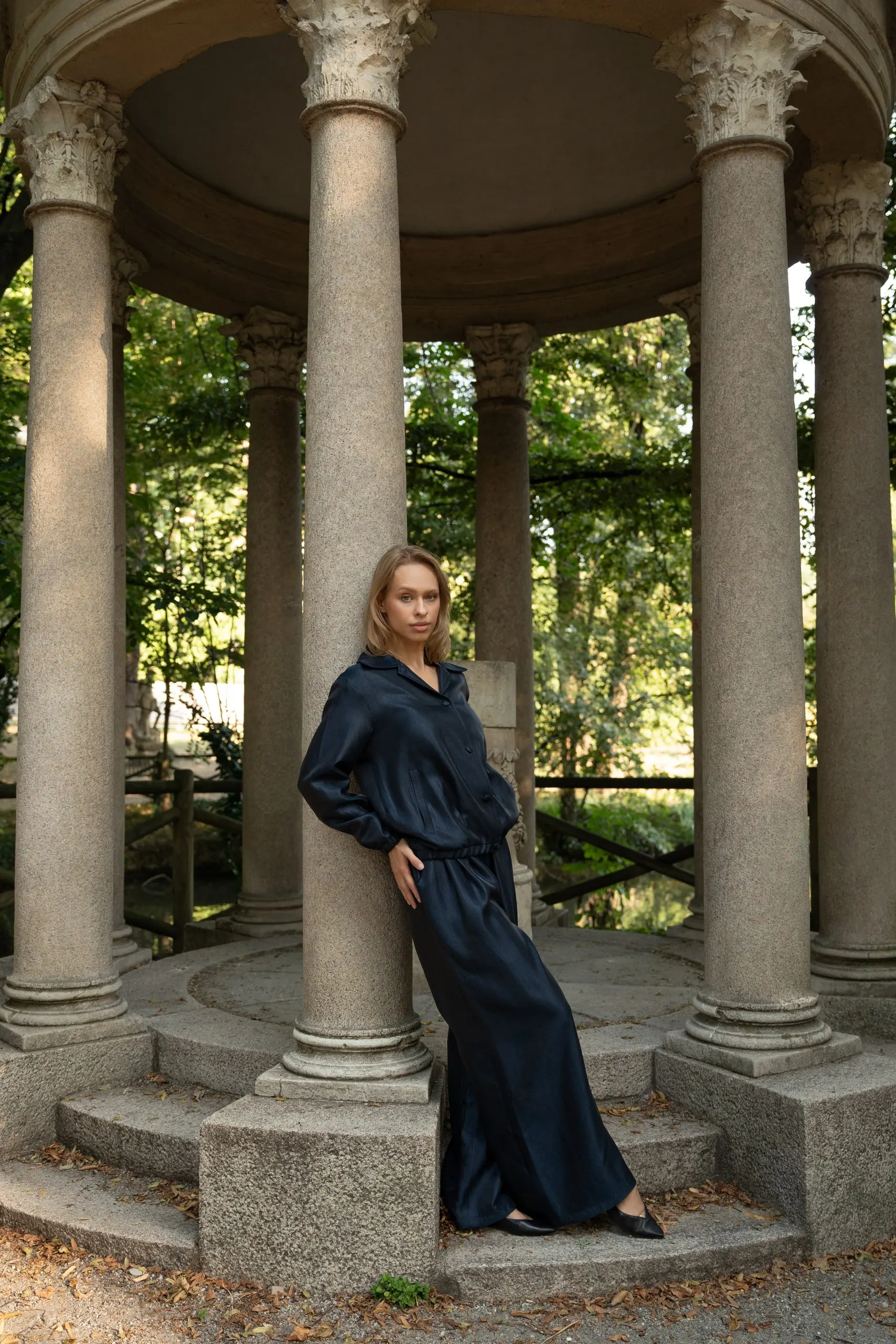 Clothé — navy satin set by the rotunda
