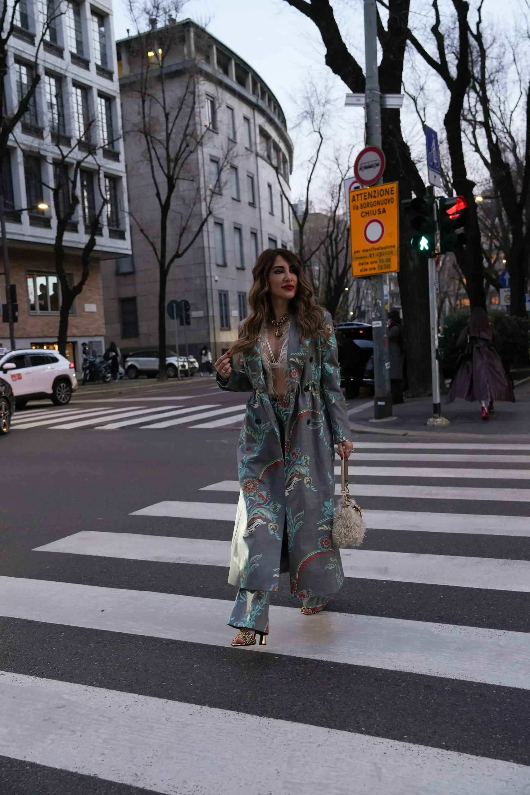 Tina Taymoor — Milan Fashion Week — crossing the avenue