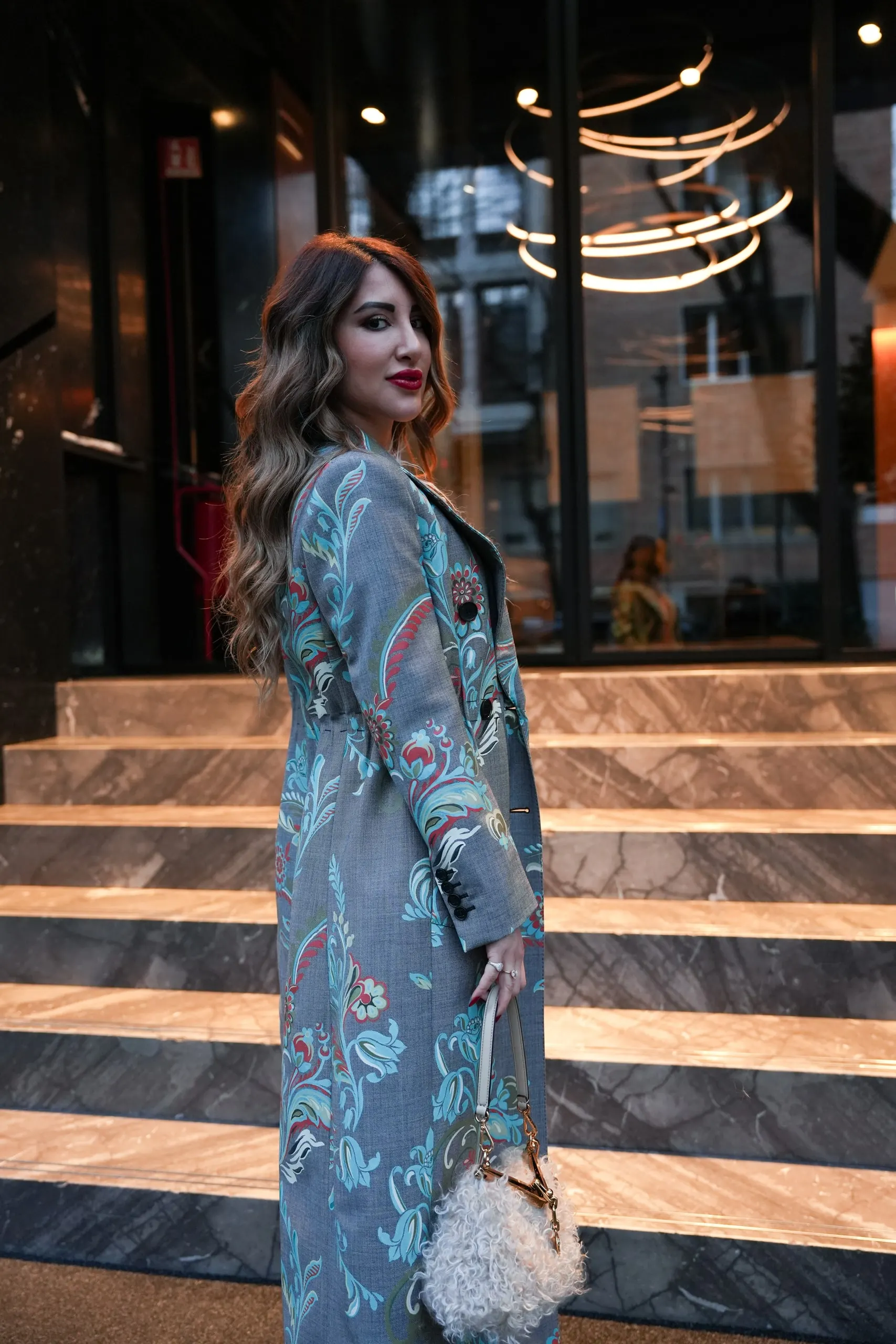 Tina Taymoor — Milan Fashion Week — turning at the steps