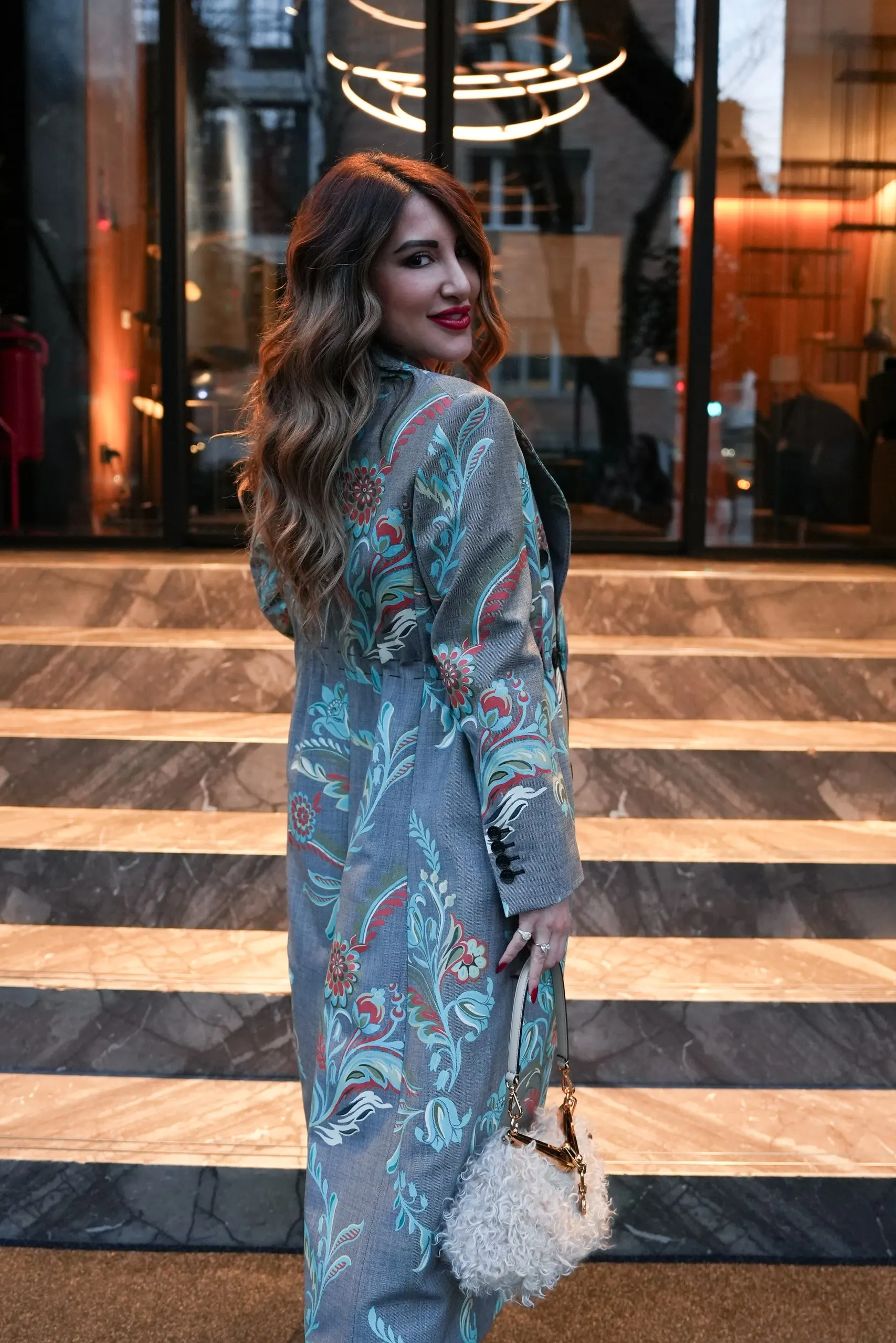 Tina Taymoor — Milan Fashion Week — looking back over the shoulder