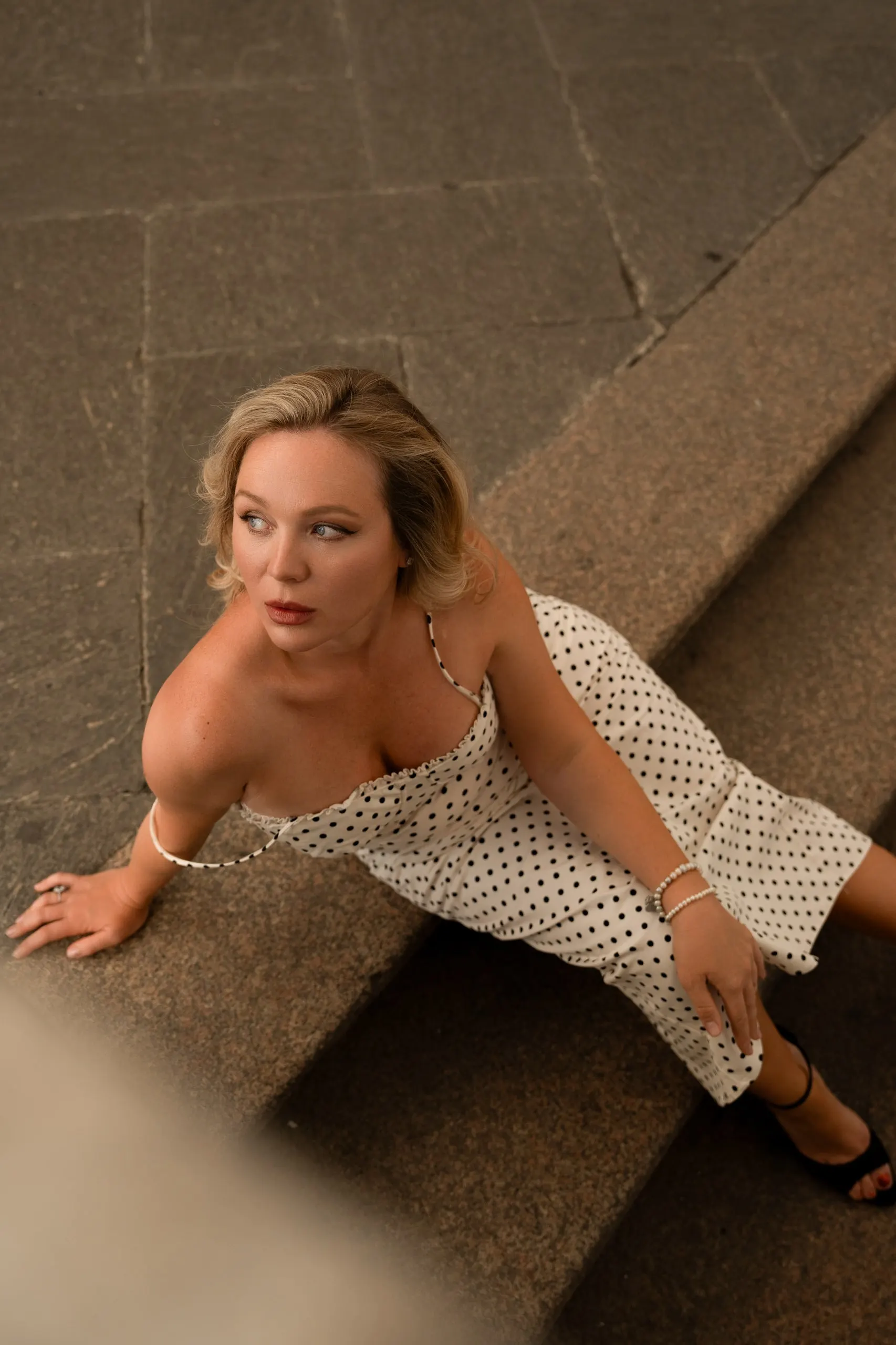 Yulia — a private shoot in Milan — by the stone parapet